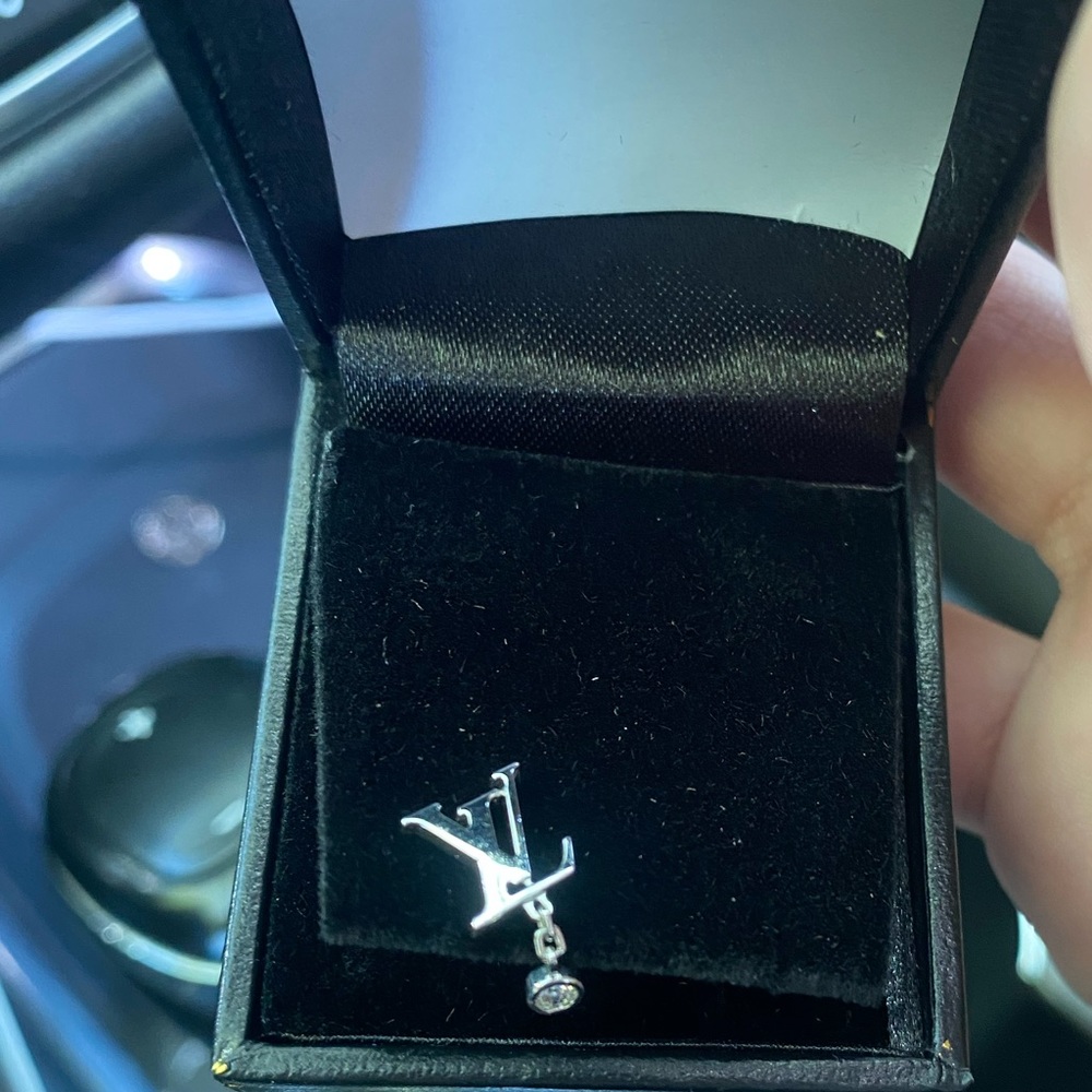 Silver Louis Vuitton earring